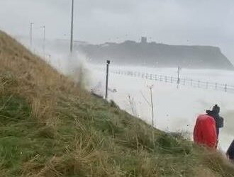 Shocking Moment Man Is Nearly Swept Away By Giant Wave As Storm Arwen